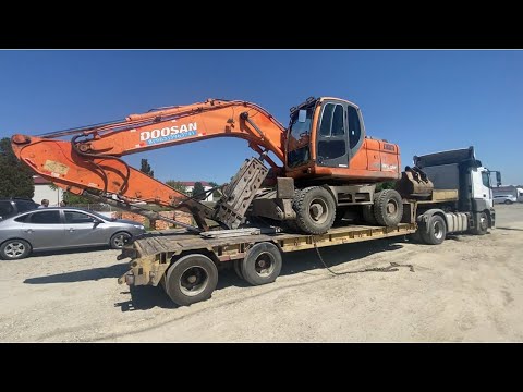 Видео: Работа На экскаваторе￼ С гидромолотам,Doosan W 190 DX ￼