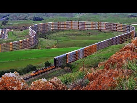 Видео: 10 Самых длинных и тяжёлых поездов в мире, о которых вы точно не знали