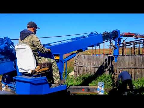 Видео: Бурение краном манипулятором с буровой навеской