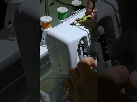 Видео: Оверлок Hobby 440D заправка ниток