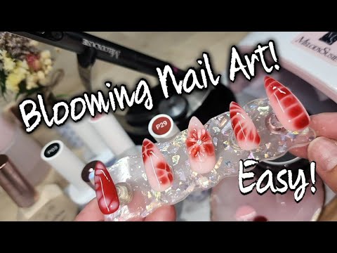 Видео: Сделай сам: набор для наращивания ногтей Blooming Gel Press On. Легко!