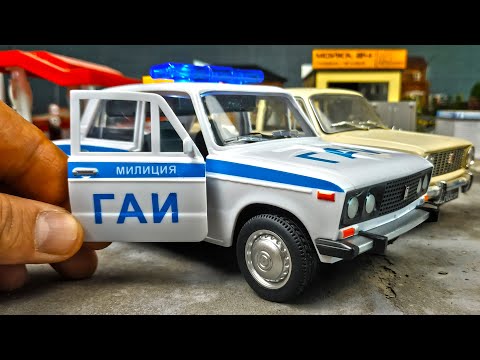 Видео: Моделька ВАЗ 2106 ГАИ со светом и звуком масштаб 1/18. Про машинки.