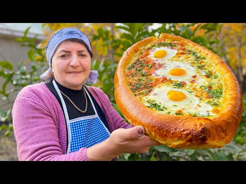 Видео: Хачапури - традиционный Грузинский сырный хлеб в дровяной печи. Любители еды должны это увидеть