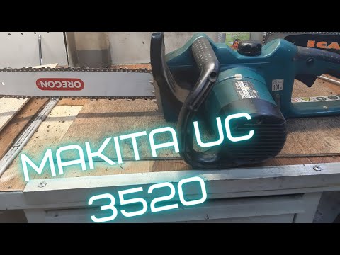 Видео: Электропила Makita UC3520 A.Бежит масло.