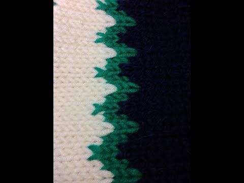 Видео: Спицами 3. Вышиваем по петлям орнамент. We embroider ornaments on hinges.  Knitting