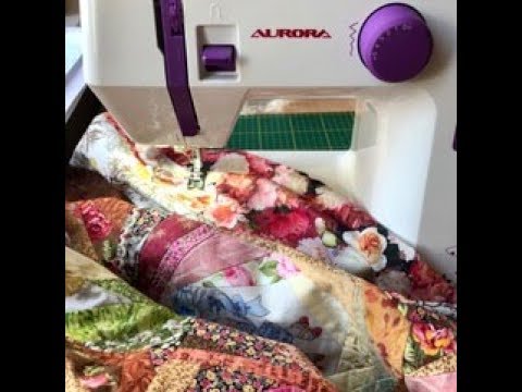 Видео: Лоскутный эфир 48. Как пришить кайму к лоскутному одеялу? 5 простых шагов.