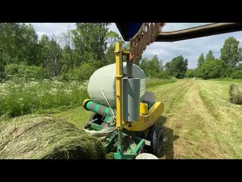Видео: Заготовка сенажа 2020.1 сезон.обмотка рулонов в стрейч-пленку TRIOVRAP
