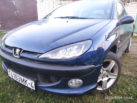 Видео: Установка дутых крыльев на Peugeot 206