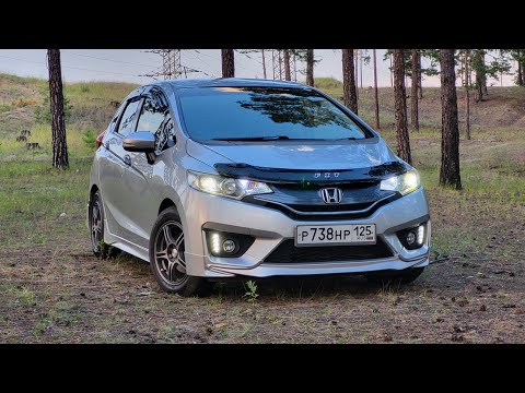 Видео: обзор Honda Fit (Хонда Фит) GK3 (третье поколение), субъективное мнение. "Овечка в волчьей шкуре"