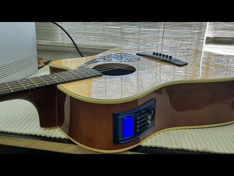 Видео: Акустическая гитара Yamaha FX370C. Часть 2. Установка звукоснимателя  Belcat.