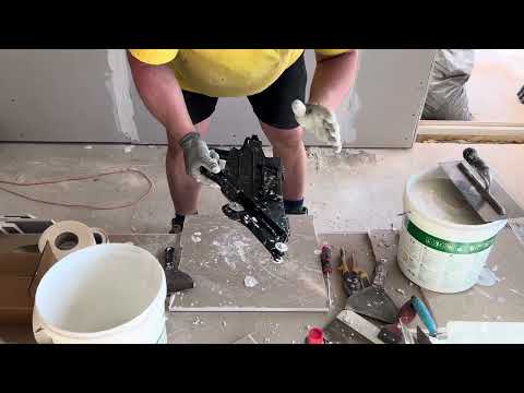 Видео: Полагане на хартия във фугите на гипсокартон с банджо
