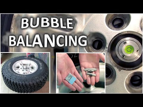 Видео: Балансировка автомобильной шины пузырьковым методом для устранения статического дисбаланса