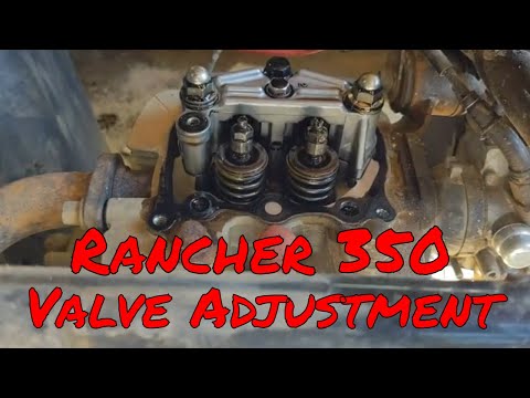 Видео: Регулировка клапанов Rancher 350
