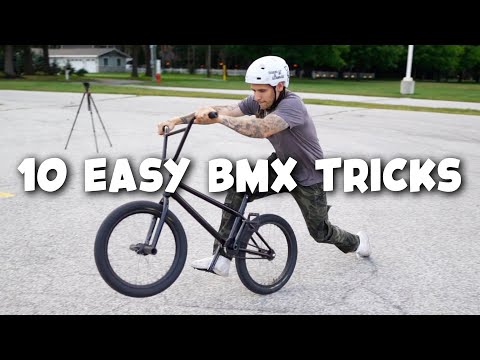 Видео: 10 простых трюков на BMX для новичков