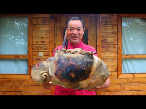 Видео: ГОРЯЧИЙ жареный на песке желудок ягненка! Баранина, завернутая внутрь, очень вкусная!