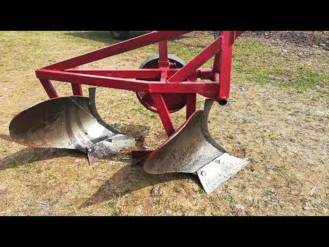 Видео: Самодельный двухкорпусный плуг для минитрактора. Обзор.