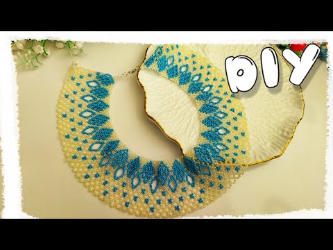 Видео: DIY ШИРОКОЕ КОЛЬЕ из БИСЕРА. БИСЕРОПЛЕТЕНИЕ