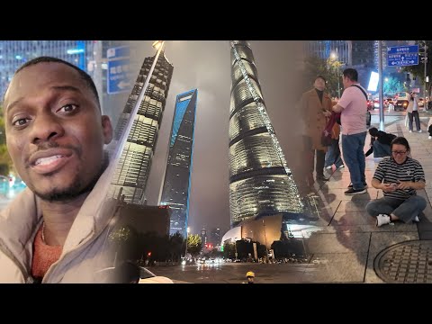 Видео: Zionfelix исследует Шанхай в Китае ночью. Это потрясающе: люди спят на полу, чтобы сделать фотогр...
