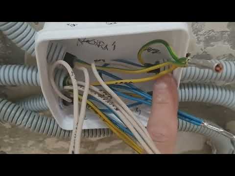 Видео: Расключение двухклавишного проходного выключателя