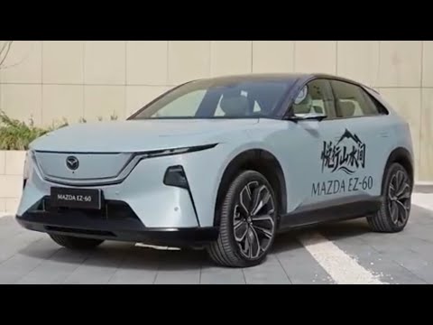 Видео: Мазда EZ60