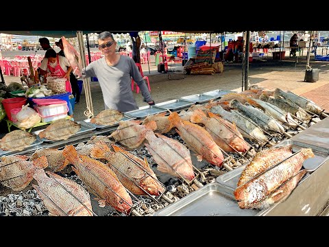 Видео: Слюнки текут! Тайский шеф-повар приготовил на гриле популярную рыбу тилапию
