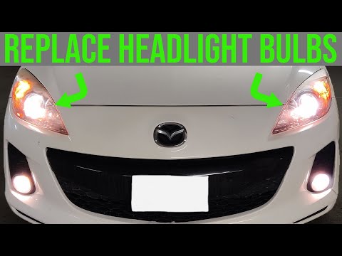 Видео: Как заменить лампы в фарах - Mazda 3 (2010-2013)