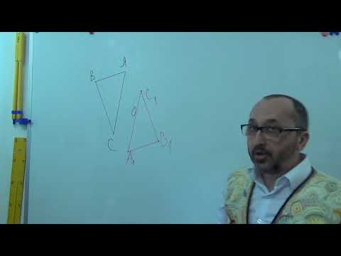 Видео: g091802 Геометричні перетворення  Центральна симетрія трикутників - 9 клас