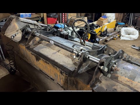 Видео: Расточка двух осей переднего ковша jcb с помощью карданчиков
