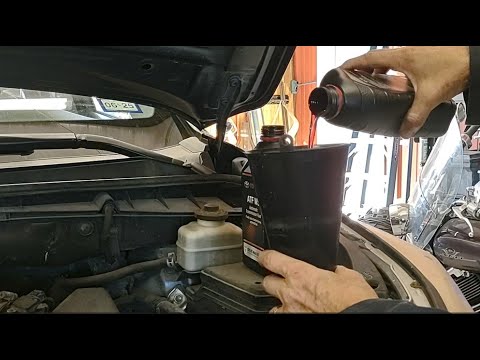 Видео: Промывка/замена трансмиссионной жидкости в Toyota Highlander 2014 года. Легко и быстро, всего нес...