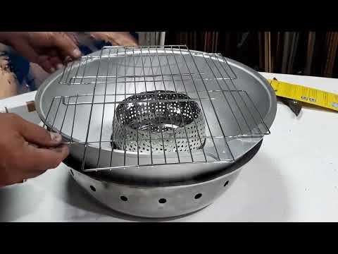Видео: Изготовление угольного гриля из алюминиевых казанов