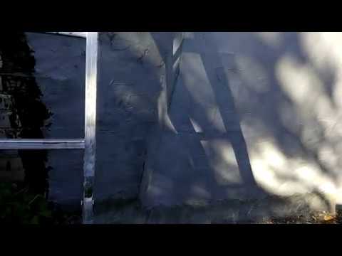 Видео: Утепление и гидроизоляция  задней стены гаража.  Часть 2