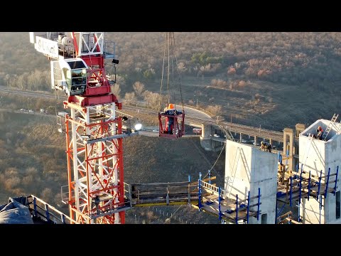 Видео: Новый строящийся мост. Бесстрашные строители и крановщик. Обзор моста от пилонов до левого берега