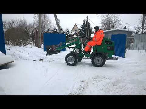 Видео: Минипогрузчик Испытание отвала