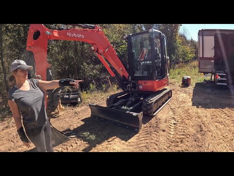 Видео: Копаем яму под почтовый ящик и убираем землю. Kubota KX033-4