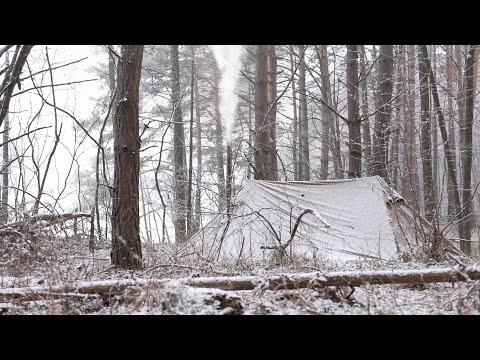 Видео: большой снегопад в зимней горячей палатке, лови и готовь на замерзшей реке