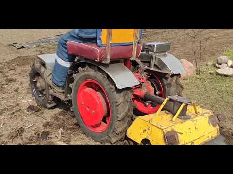 Видео: Передний адаптор к мотоблоку. Испытание с фрезой.