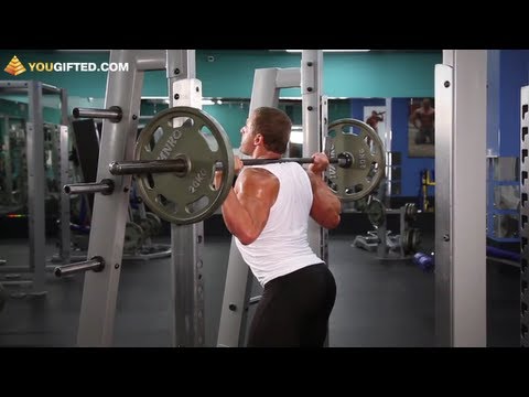 Видео: Упражнения для ног. Приседания со штангой.