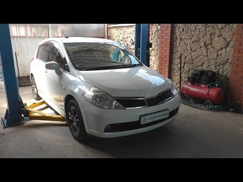 Видео: Замена сайлентблоков переднего подрамника на Ниссан Тиида 1,6 Nissan Tiida 2008 года