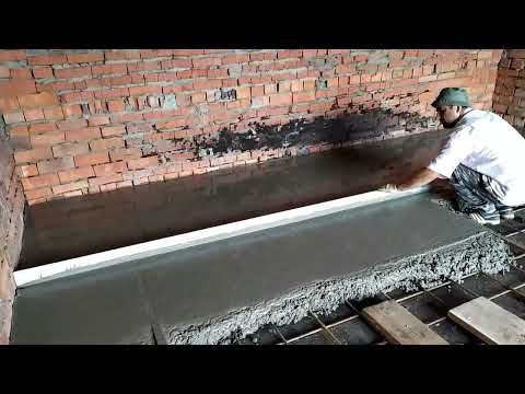 Видео: Ручная заливка бетонного пола в гараже/floor screeding (Омск)