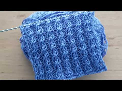 Видео: Объёмный, эластичный узор спицами для свитера, жилета, блузона, шапочки.