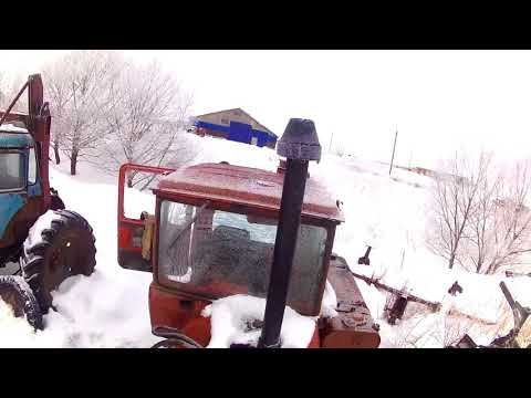 Видео: Запуск ДТ-75 и расчистка снега