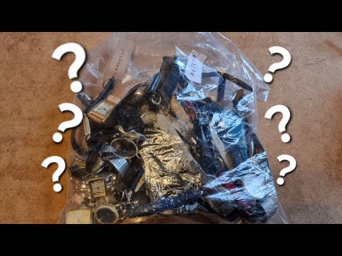 Видео: Я заплатил 10 фунтов за эту сумку с часами, посмотрим, что мы получим.