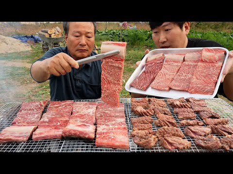 Видео: Говяжьи ребрышки на углях и холодная гречневая лапша - кулинарное шоу Мукбанг