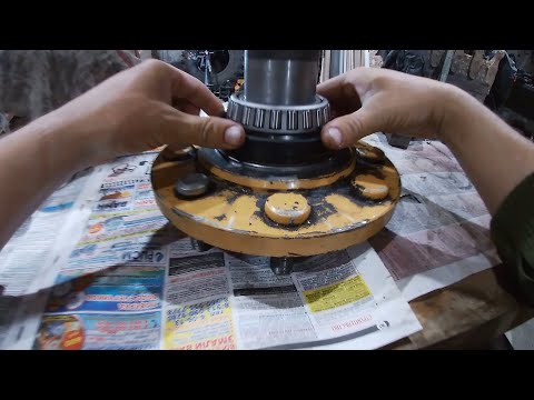 Видео: Замена подшипника,сальника,на полуоси заднего моста. Часть № 6