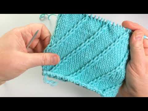 Видео: Вязание перемещённых петель без вспомогательных спиц. Pattern of slip and displaced loops knitting.