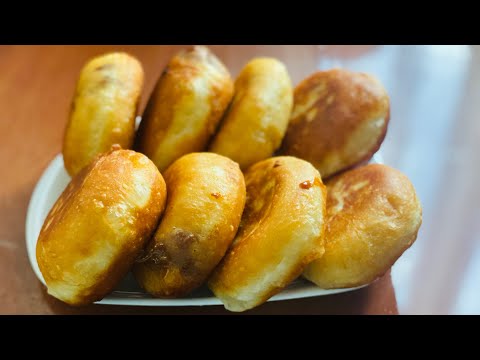 Видео: Пончики зі згущенкою🍩-це ніжна, ароматна й неймовірно смачна випічка! Пухке тісто та смачна начинка!