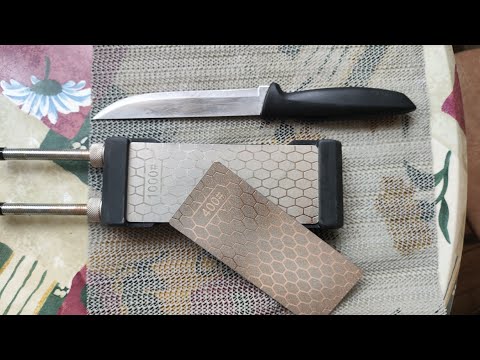 Видео: Заточка на алмазных пластинах. Заточка ножа на руках