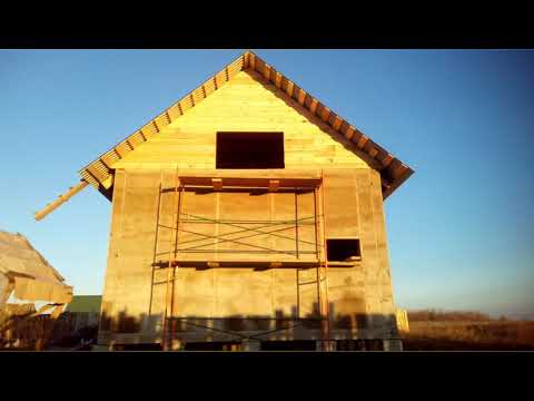 Видео: Дом из опилкобетона.Внешняя отделка.