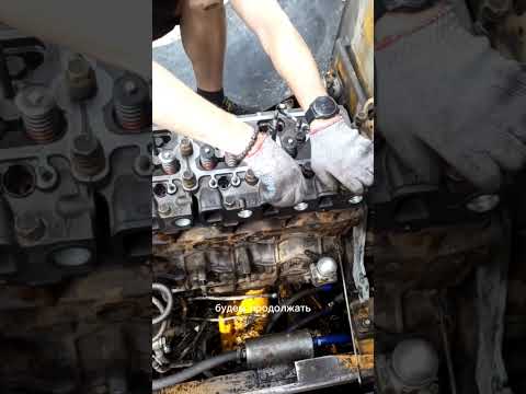 Видео: ремонт фронтального погрузчика митсубер (установка головок, регулировкаклапанов)