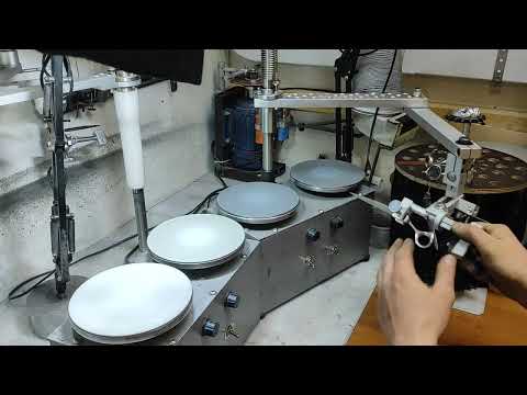 Видео: заточка ножниц при помощи манипулятора